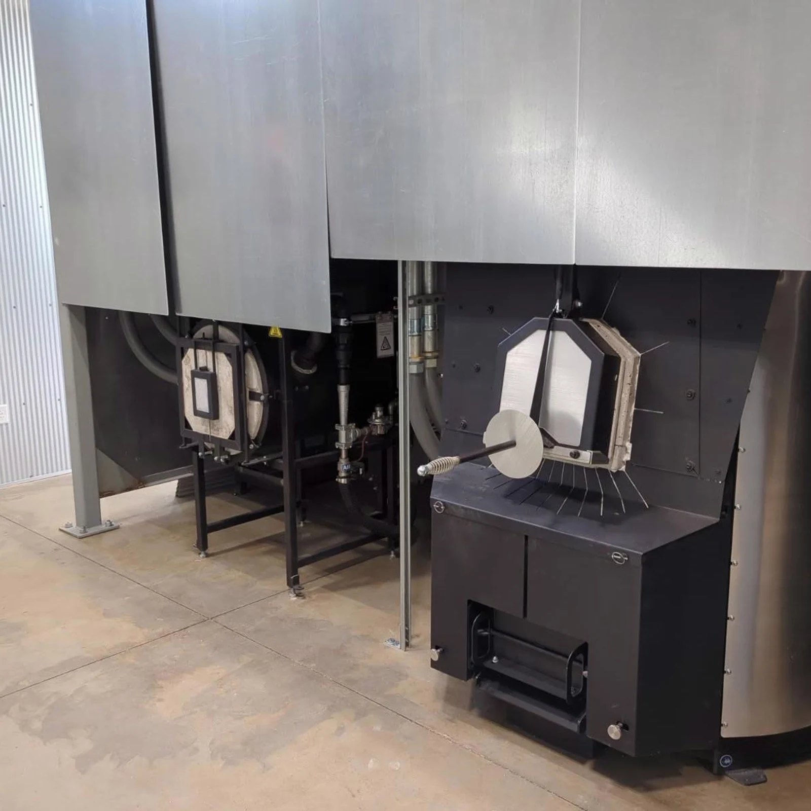Glassmaking furnaces and equipment inside the North Carolina Glass Center Black Mountain studio